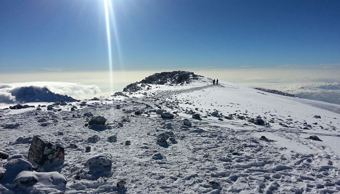 Snow-covered terrain on Mount Kilimanjaro close to the summit